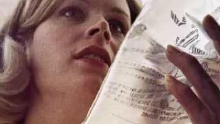 Nurse holding a Viaflex IV container