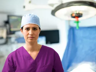 A female surgeon in an operating room