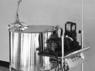 Black and white image of a twin coil artificial kidney