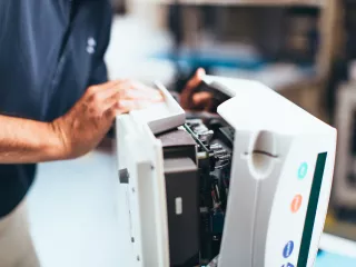 Technician repairs device